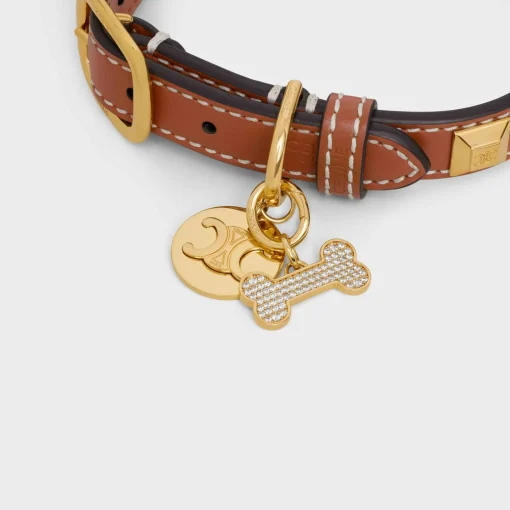 Bone strass dog medal in brass