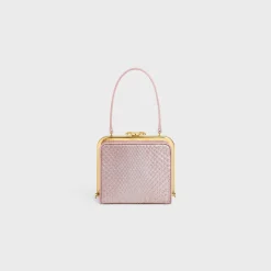 CELINE LANA MINAUDIERE in pearly python