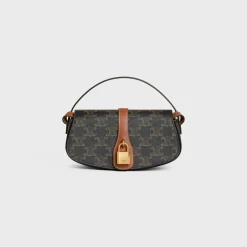 CLUTCH ON STRAP TABOU in Triomphe canvas and calfskin