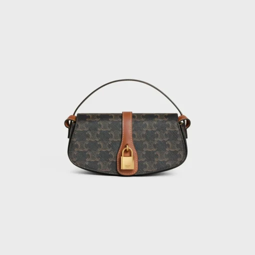 CLUTCH ON STRAP TABOU in Triomphe canvas and calfskin