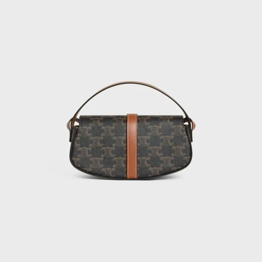 CLUTCH ON STRAP TABOU in Triomphe canvas and calfskin
