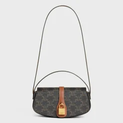 CLUTCH ON STRAP TABOU in Triomphe canvas and calfskin
