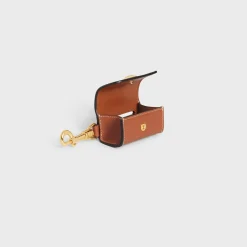 DOG BAGS HOLDER IN SMOOTH CALFSKIN WITH PYRAMID STUDS