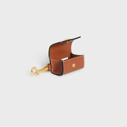 DOG BAGS HOLDER IN SMOOTH CALFSKIN WITH PYRAMID STUDS