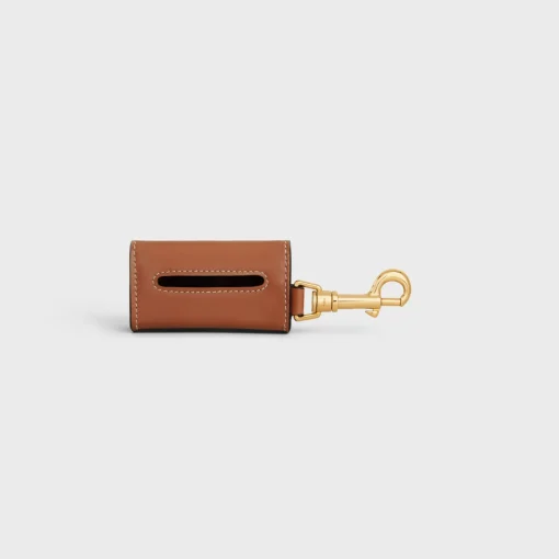 DOG BAGS HOLDER IN SMOOTH CALFSKIN WITH PYRAMID STUDS