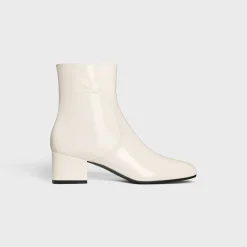 LES BOTTES CELINE TRIOMPHE ZIPPED BOOT in PATENT CALFSKIN
