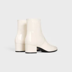 LES BOTTES CELINE TRIOMPHE ZIPPED BOOT in PATENT CALFSKIN