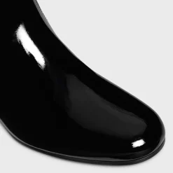 LES BOTTES CELINE TRIOMPHE UNDER THE KNEE BOOT in PATENT CALFSKIN