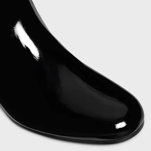 LES BOTTES CELINE TRIOMPHE UNDER THE KNEE BOOT in PATENT CALFSKIN