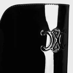 LES BOTTES CELINE TRIOMPHE UNDER THE KNEE BOOT in PATENT CALFSKIN