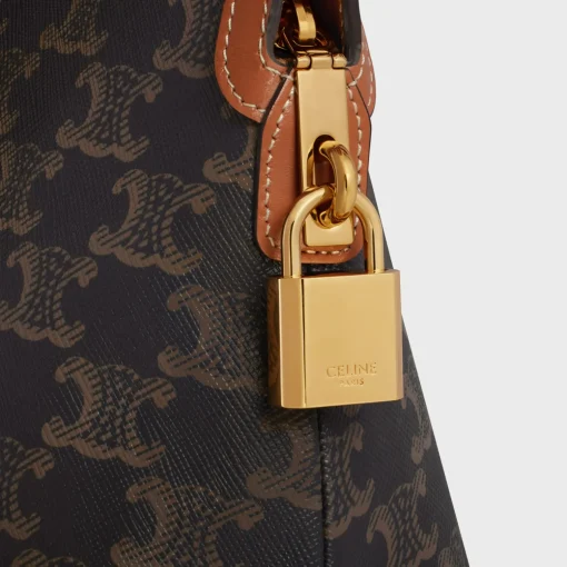 Lock Toiletry Pouch in Triomphe Canvas and Calfskin