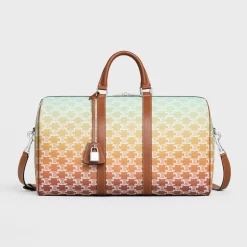 Medium Travel Bag in TRIOMPHE CANVAS SUNSET AND CALFSKIN