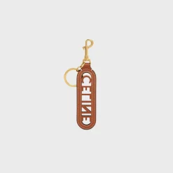 PERFORATED CELINE KEYRING CHARM IN SMOOTH CALFSKIN