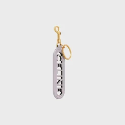 PERFORATED KEYRING CHARM CELINE in SMOOTH CALFSKIN with Gold FInishing