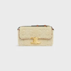 SHOULDER BAG CLAUDE in SHEARLING WITH TRIOMPHE EMBROIDERIES