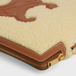 SMALL POUCH WITH STRAP in SHEARLING AND CALFSKIN