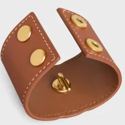 Triomphe Hair Cuff in Calfskin and Brass with Gold Finish
