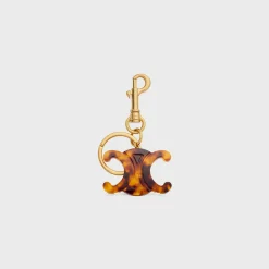 TRIOMPHE KEYRING CHARM in PLEXIGLASS with GOLD FINISHING