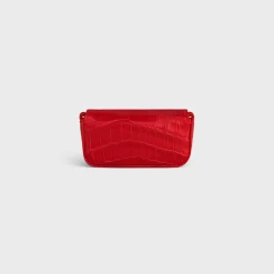 TRIOMPHE LIPSTICK CASE ON CHAIN IN NILOTICUS CROCODILE