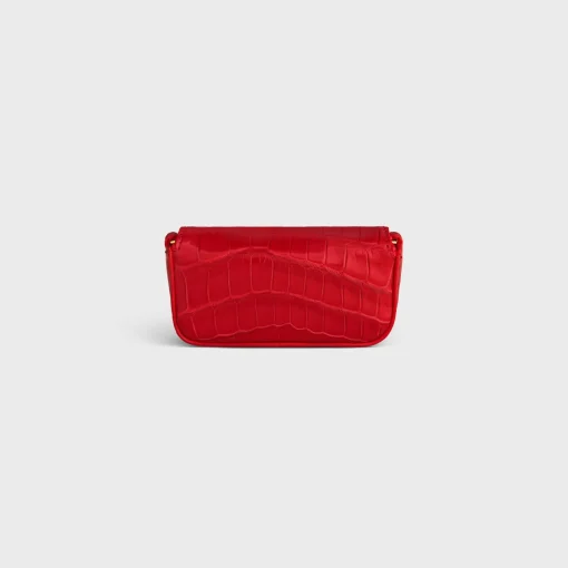 TRIOMPHE LIPSTICK CASE ON CHAIN IN NILOTICUS CROCODILE