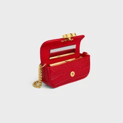 TRIOMPHE LIPSTICK CASE ON CHAIN IN NILOTICUS CROCODILE