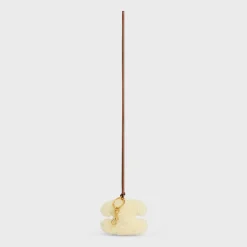 TRIOMPHE pom-pom keyring in SHEARLING AND SMOOTH CALFSKIN with Gold Finishing