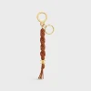 TRIOMPHE SCOUBIDOu KEYRING in smooth calfskin with Gold Finishing