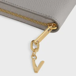 V CHARM in Brass