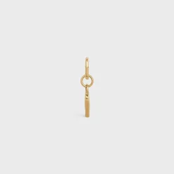 V CHARM in Brass