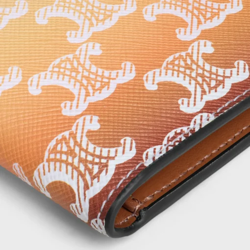 VERTICAL CARD HOLDER in TRIOMPHE CANVAS SUNSET
